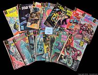 Overhead view of all 20 Gold Key comic books fanned out