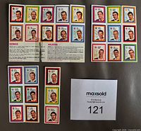 Front view of four unperforated Colgate NHL sticker panels displaying all 28 stickers