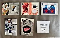 front view all five NHL jersey patch cards with MaxSold lot card