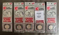 Front view of all five sealed Calgary Flames Hockey Dollars