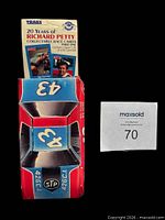 Front view of Traks card set packaging resembling red #43 STP Plymouth