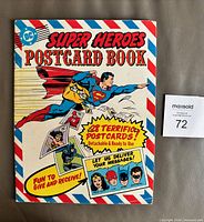 Front cover of 1981 DC Super Heroes Postcard Book showing Superman and promotional text
