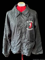 Front view of black CFLPA jacket on mannequin