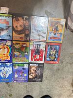 All eleven DVD cases laid out showing covers