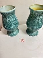 Two blue crackle mosaic glass lamps side by side