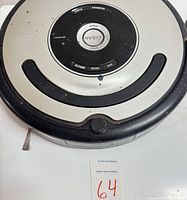 Top view of iRobot Roomba showing controls and finish