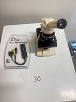 Microscope and packaged USB capture device side by side