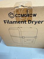 Front of retail box showing Comgrow branding and product illustration