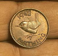 Reverse view close-up of 1942 farthing showing wren and date