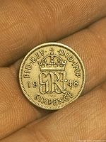Reverse of 1948 sixpence showing crown, GR monogram, date, denomination