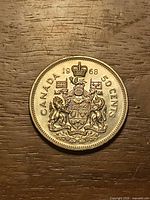 Reverse showing Canadian Coat of Arms and 1968 date