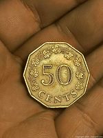 Obverse of Malta 50-cent dodecagonal coin showing denomination and vine motif