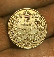 Reverse of 1929 Canadian 25-cent coin showing denomination, country, date, crown, maple wreath