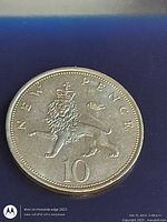 Reverse showing crowned lion and NEW PENCE 10 legend