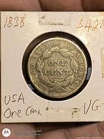 Reverse of 1838 large cent showing wreath and ONE CENT text