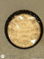 Reverse of 1903 H 10-cent coin showing date and wreath design