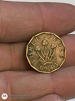 Reverse showing thrift plant, THREE PENCE legend, date 1943