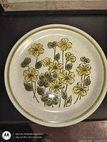 Top view of floral stoneware plate