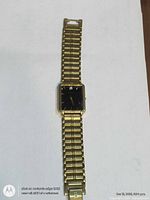 Full view of Bulova gold-tone stretch-band wristwatch