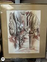 Frontal view of framed artwork showing entire composition and frame