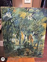 Full view of unframed jungle scene painting