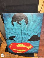 Front view of Superman vinyl print on canvas