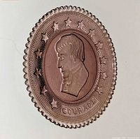 Top view showing full design, portrait, stars, COURAGE text