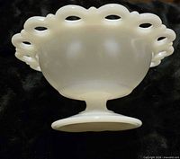 Side profile showing pedestal base and bowl form