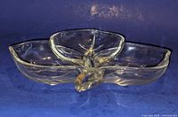 Oblique view shows three compartments and stem handle