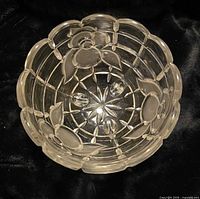 Interior view showing frosted floral panels and scalloped rim