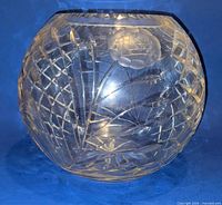 front view showing etched floral and cut geometric designs on bowl