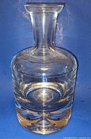 Full front view of clear crystal decanter showing shape and overall condition