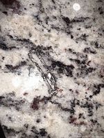 Full view of sterling silver baby bracelet on countertop