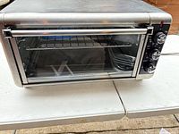Front view of Black+Decker toaster oven on table