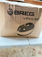 Outer shipping box showing Breg VPULSE branding