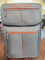 Front view showing Nautica logo, fabric, pockets