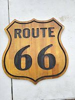 Front view of wooden Route 66 wall plaque showing full design and lettering