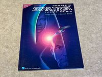 Front cover of Hal Leonard Complete Star Trek Theme Music book