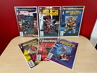 All six bagged and boarded Futures End #1 comics displayed on table