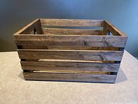 overall view showing slatted sides and open top