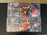 All six Star Trek film magazines in protective sleeves
