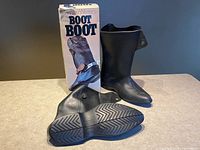 Overall view of both overshoes and box