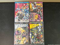 All four sealed Wizard magazine issues laid out face up