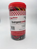 Front view of sealed container showing product label, red lid, multicolor cords inside