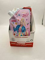 Front view of box showing JoJo Siwa ‘Dreamer’ pouch and Smart Care branding