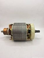 Side view of entire armature showing laminations, windings, commutator