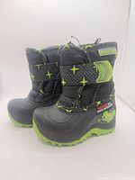 Side view of both boots showing overall design and colors