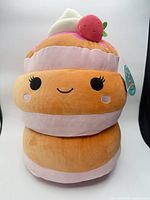Front view of Squishmallows Sawtelle pastry plush with tag