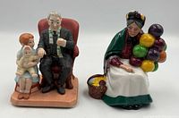 Front view of both figurines