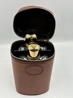 Case open showing two glass flasks inside